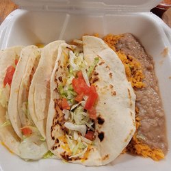 Shredded beef tacos, rice and beans