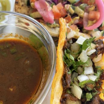Linda's Kitchen - Quesabirria and dipping sauce in the foreground, mahi in the background - Food Trucks Near Me - Kahului, Hawaii Linda's Kitchen - Quesabirria and dipping sauce in the foreground, mahi in the background - Food Trucks Near Me - Kahului, Hawaii