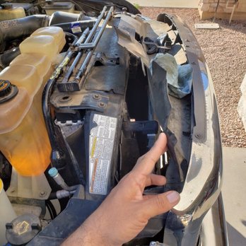 Lifetime Automotive - Ripped plastic from push pins - Auto Repair Near Me - Tempe, Arizona