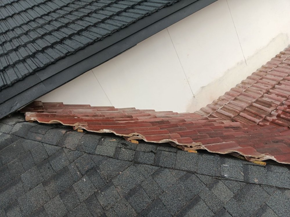 Slide of Rubio R Roofing