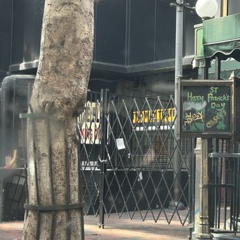 Casey's Irish Pub - The closed scissor gate at Casey's - Pubs Near Me - Los Angeles, California