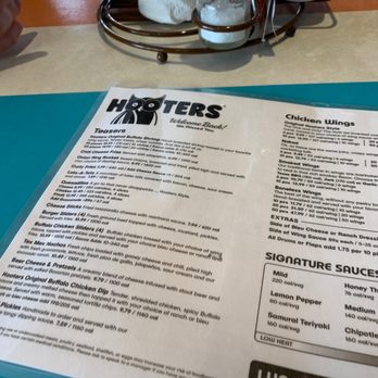 Hooters - a menu on a table - Sports Bars Near Me - Ft. Myers, Florida Hooters - a menu on a table - Sports Bars Near Me - Ft. Myers, Florida