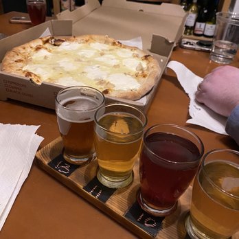 Crafty Beer Guys - Their table and fought. The pizza was from down the street. - Wine Bars Near Me - Huntersville, North Carolina Crafty Beer Guys - Their table and fought. The pizza was from down the street. - Wine Bars Near Me - Huntersville, North Carolina
