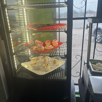 El Coqui Restaurant - Dessert cabinet for the buffet. Brownies, cupcakes, cookies, and rice pudding - Puerto Rican Near Me - San Antonio, Texas
