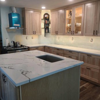 INI Construction - a kitchen with a marble counter top - General Contractors Near Me - Santa Rosa, California INI Construction - a kitchen with a marble counter top - General Contractors Near Me - Santa Rosa, California
