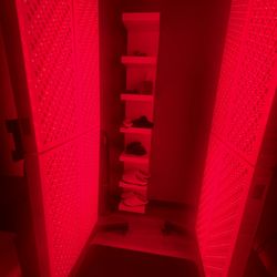 Restore Hyper Wellness - Standing between the 2 panels provides the red light laser treatment
