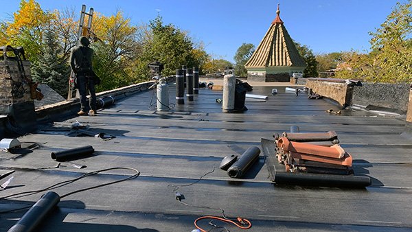 Slide of Olive Tree Roofing and Construction