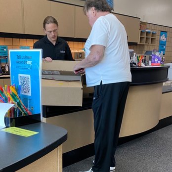 The UPS Store - Both are maskless, exchanging each other's COVID juices... yuk. - Shipping Centers Near Me - Tampa, Florida