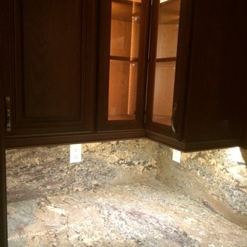 Palmore Electric - Add crystal glassware and this corner cabinet explodes with rainbows courtesy of the LED ambient/ accent lighting. - Electricians Near Me - Mill Creek, Washington
