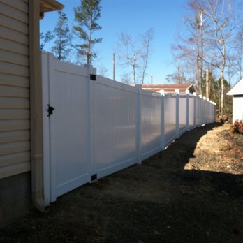 Walker Landscape & Fence - a view of a white vinyl fence - Landscaping Near Me Walker Landscape & Fence - a view of a white vinyl fence - Landscaping Near Me