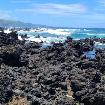Hana and Beyond Tours - Lava rocks in the Black Sand Beaches - Bus Tours Near Me Hana and Beyond Tours - Lava rocks in the Black Sand Beaches - Bus Tours Near Me