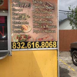 a truck parked in front of a restaurant a truck parked in front of a restaurant