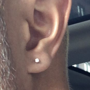 Nine Moons Piercing - Diamond stud in both ears by Johnny Pearce. - Piercing Near Me - New York, New York