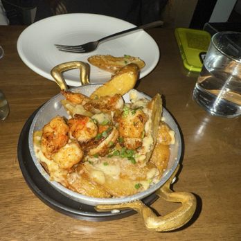 OLIVIA - Potato wedges with shrimp - Italian Near Me - Tampa, Florida
