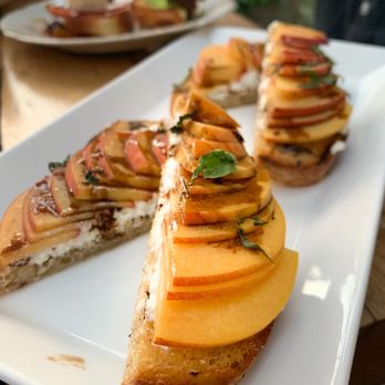 Brooklyn Winery - a plate of appetizers on a table - Venues & Event Spaces Near Me - Brooklyn, New York