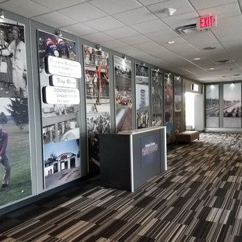 Brickyard Crossing Smokehouse - Lobby Wall filled with old photos - Smokehouse Near Me - Indianapolis, Indiana