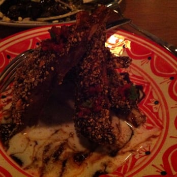 Byblos - Lamb Ribs with dukkah, buttermilk sauce, carob molasses and red chili schug - Mediterranean Near Me - Toronto, Ontario Byblos - Lamb Ribs with dukkah, buttermilk sauce, carob molasses and red chili schug - Mediterranean Near Me - Toronto, Ontario