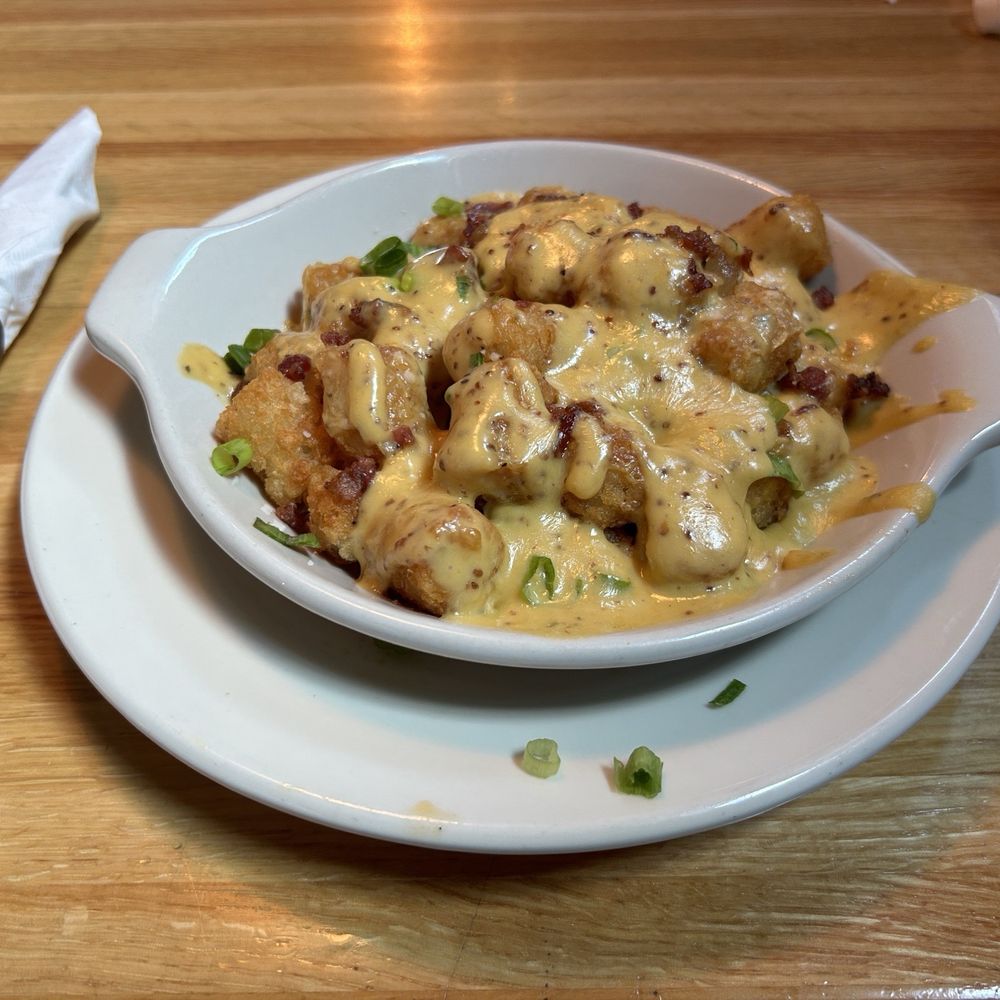Old Chicago Pizza + Taproom - LEGENDARY LOADED TOTS - Pizza Near Me - Columbia, South Carolina Old Chicago Pizza + Taproom - LEGENDARY LOADED TOTS - Pizza Near Me - Columbia, South Carolina