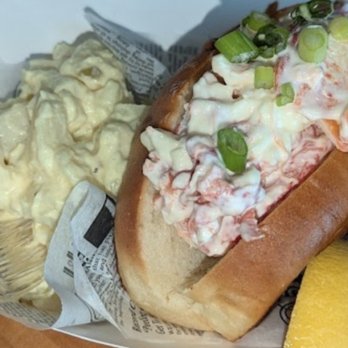 The Lobster Cage - Chilled lobster roll with potato salad - Seafood Near Me - Pensacola, Florida The Lobster Cage - Chilled lobster roll with potato salad - Seafood Near Me - Pensacola, Florida