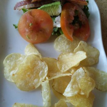 Panera Bread - Worst looking $7 sandwich I've had in a while . . . crappy tomatoes . . . minuscule amount of chips . . . THUMBS DOWN . . . - Sandwiches Near Me - Bridgeville, Pennsylvania