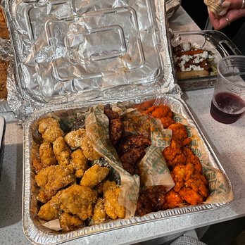Wingstop - a tray of food on a table - Chicken Wings Near Me - Indianapolis, Indiana Wingstop - a tray of food on a table - Chicken Wings Near Me - Indianapolis, Indiana