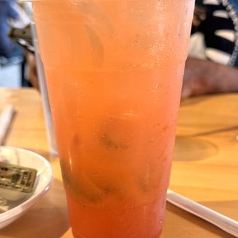 The White Sheep - Strawberry Lemonade Refresher, which has mashed strawberries, fresh lime juice and mint topped with ginger beer! - Breakfast & Brunch Near Me - Orland Park, Illinois