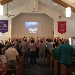 Victory Church - Men of the church praising God.