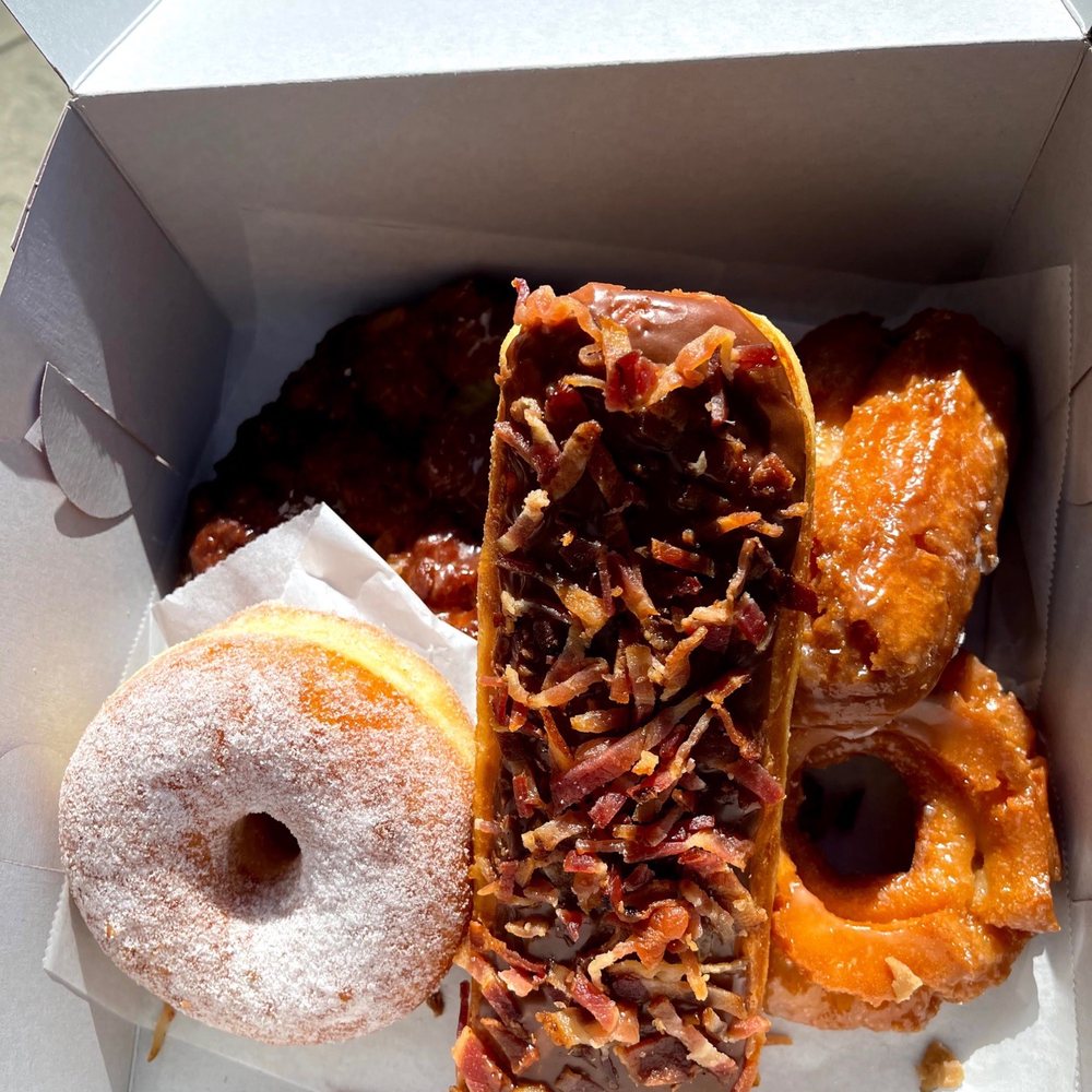 a variety of donuts in a box a variety of donuts in a box