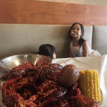 Crawfish Cafe - Cajun garlic butter flavored crawfish - Seafood Near Me - Houston, Texas