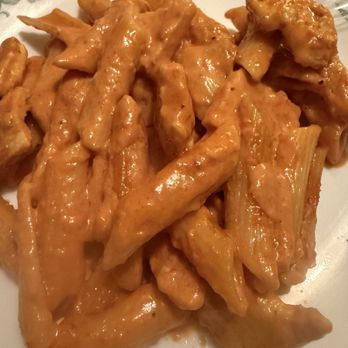 Santos Wood Fired Pizza - Penne à la vodka with chicken - Italian Near Me - Fort Pierce, Florida Santos Wood Fired Pizza - Penne à la vodka with chicken - Italian Near Me - Fort Pierce, Florida