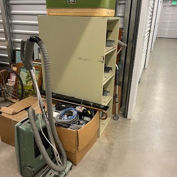 Mike's OC Remove Junk - An old ice chest, box of electronics, vacuum, box of old hangers and the heavy filing cabinet no drawers. - Junk Removal & Hauling Near Me Mike's OC Remove Junk - An old ice chest, box of electronics, vacuum, box of old hangers and the heavy filing cabinet no drawers. - Junk Removal & Hauling Near Me