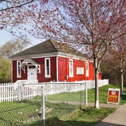 Strawberry Vale Preschool - Street view of the little red schoolhouse