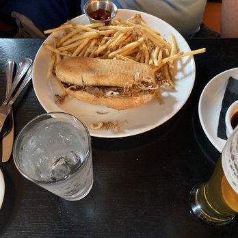 Feast - French dip sandwich and shoestring fries - Steakhouses Near Me - Chesterfield, Michigan Feast - French dip sandwich and shoestring fries - Steakhouses Near Me - Chesterfield, Michigan