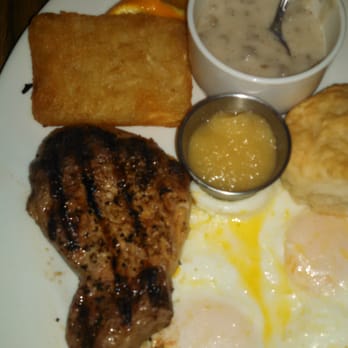 Arts Bar & Grill - 10 ounce chop breakfast. My dad is a meat and bbq lover from texas...he practically gave the cook a high five when we left. - Sports Bars Near Me - Riverside, California
