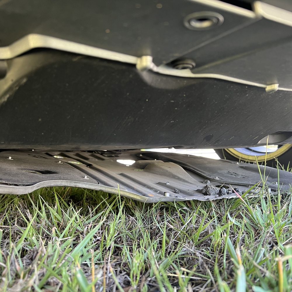 Uncured car shield that Valvoline did not secure after an oil change. Uncured car shield that Valvoline did not secure after an oil change.