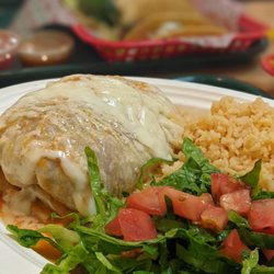 Alchile Mexican Grill - Don't let this Wet Burrito fool you, I packed mine with 2 meats!