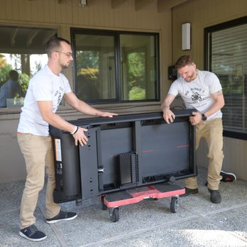 Mr. Minar's Moving Magic - Ryan and Syd moving a peloton treadmill. - Movers Near Me - Mercer Island, Washington Mr. Minar's Moving Magic - Ryan and Syd moving a peloton treadmill. - Movers Near Me - Mercer Island, Washington