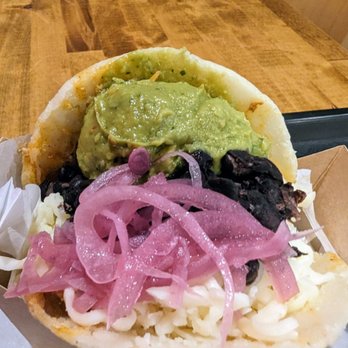 Montebello - close up of the beans, avocado, and pickled onion topping choice. - Food Trucks Near Me - Saint Paul, Minnesota