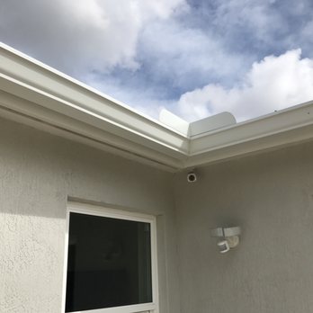 Rain Gutters Solution - Corner in back yard I think that's a splash guard. - Gutter Services Near Me - Homestead , Florida Rain Gutters Solution - Corner in back yard I think that's a splash guard. - Gutter Services Near Me - Homestead , Florida