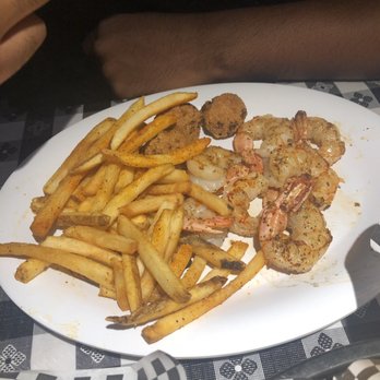 Boondocks - "Grilled" shrimp. Fries and hush puppies. - Southern Near Me - Fort Smith, Arkansas