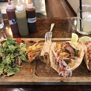 Deux 22 - a plate of tacos and a salad - Bars Near Me - Quebec City, Quebec Deux 22 - a plate of tacos and a salad - Bars Near Me - Quebec City, Quebec