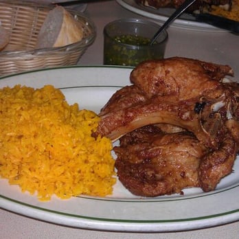 Cafe Central - The must-order fried porkchops!! - Puerto Rican Near Me - Chicago, Illinois