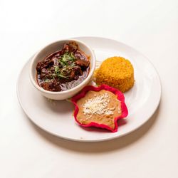 Morenas Mexican Cuisine - Slow-braised Angus beef cooked in its own juices.
Served with Mexican rice, beans, onion, cilantro, grilled chiles