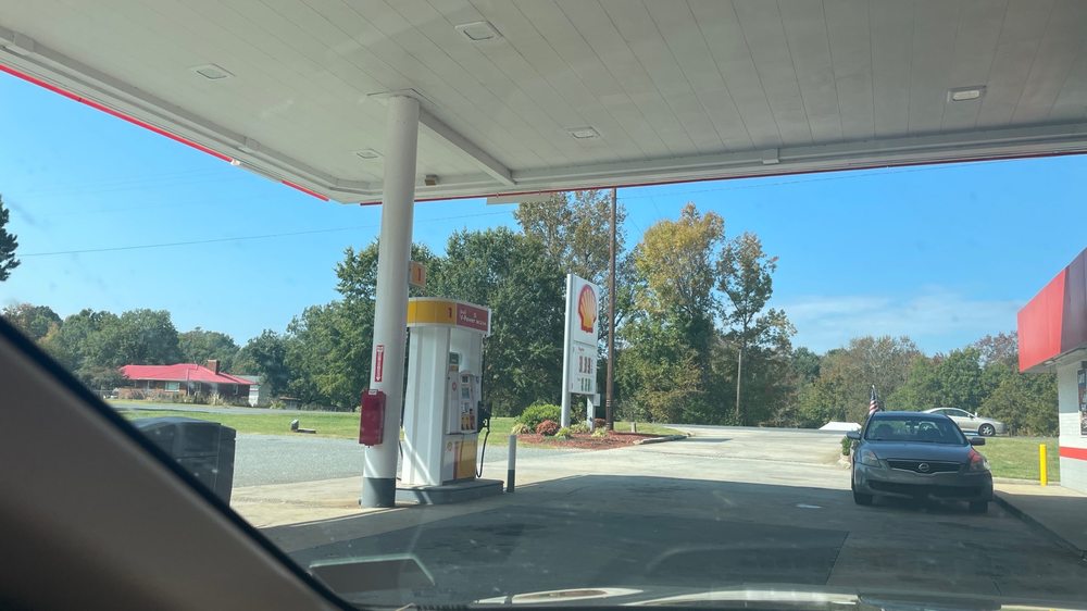 Quality Oil Company Logo