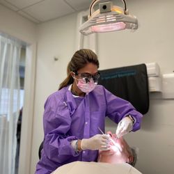 Advanced Periodontics & Implant Dentistry New Jersey - Tiffany and a hygiene patient.