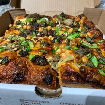 Benchwarmers Bagels And Coffee - Red pie with roasted eggplant, lamb, crispy chickpeas, mozzarella, green onion, and mint - Sandwiches Near Me - Raleigh, North Carolina