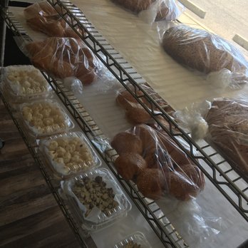 Sahar Bakery - Bakers rack: bottoms rack is cookies, middle shelf round buns are sweet with walnuts and apple, top rack is sweet bread - Bakeries Near Me - Tonawanda, New York