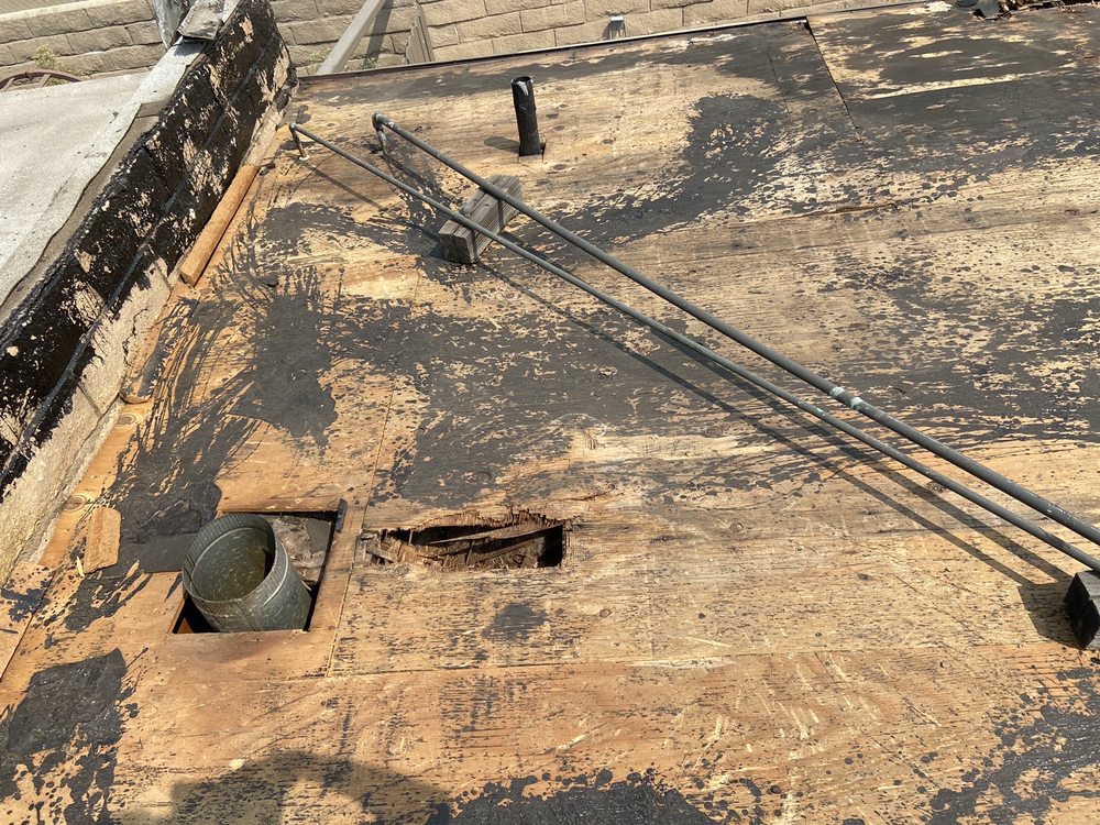 Slide of Bottom Dollar Roofing