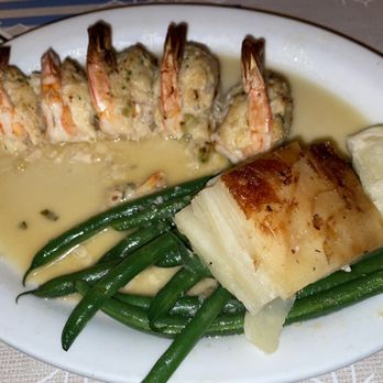 Sandbar & Grill - Grilled prawns with dungenous crab and scalloped potatoes. - Seafood Near Me - Monterey, California