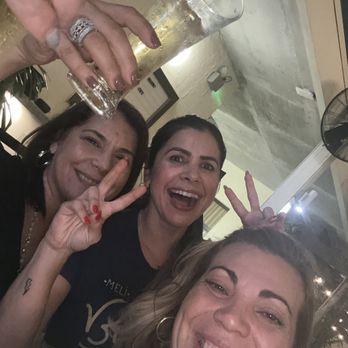 Rick's Upstairs - a group of women posing for a picture - Dance Clubs Near Me - Key West, Florida